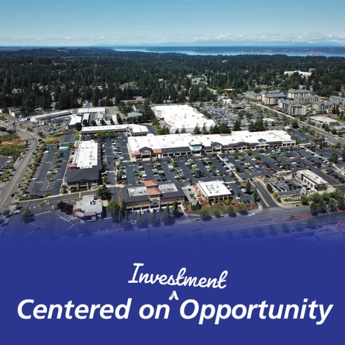 Drone Shot of Federal Way with text: "Centered on Investment Opportunity"